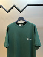Green crewneck T-shirt with Dior logo printed on the chest