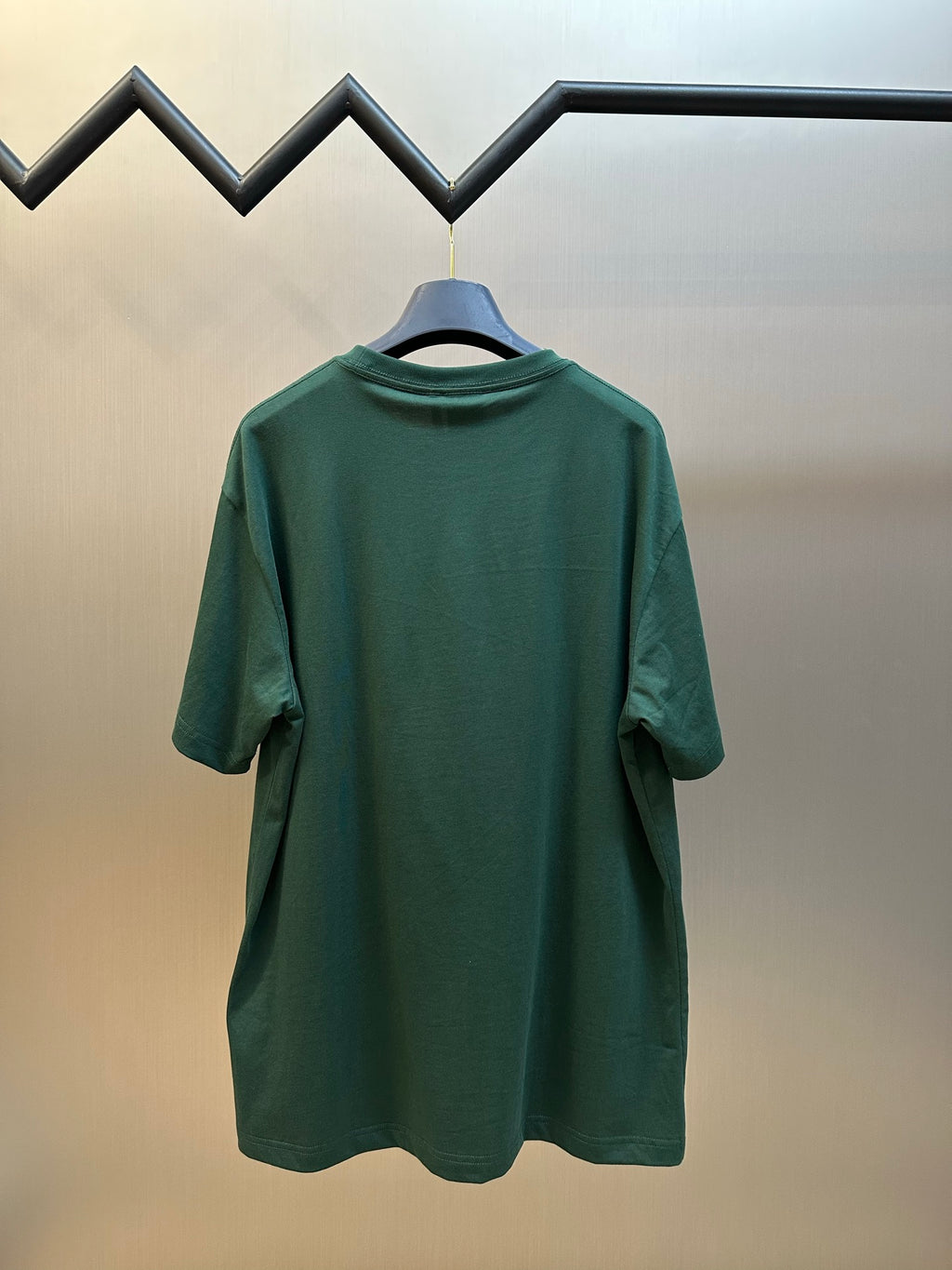 Green crewneck T-shirt, back view