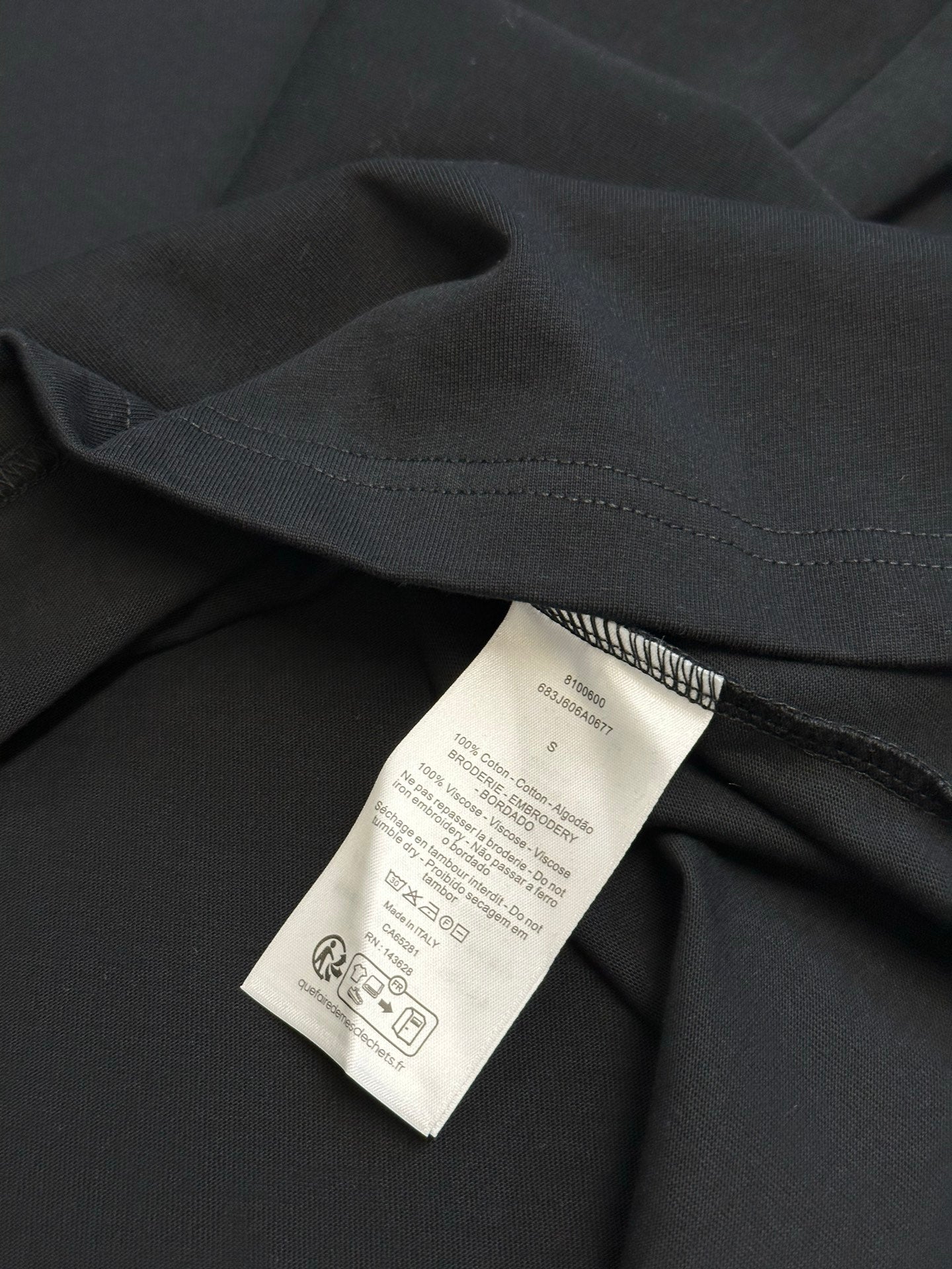 Black Dior T-shirt with attached size and care label