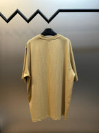 Beige T-shirt back view with crew neck and short sleeves