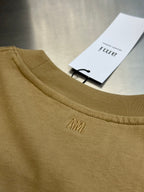 Amiri T-shirt light tan neckline with AM I embroidery and white hang tag
