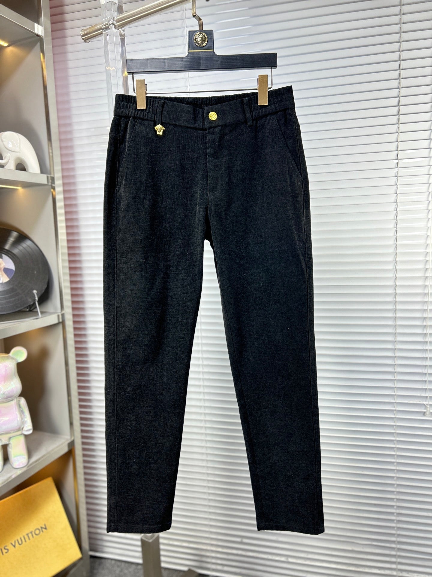 Versace dark jeans with button waist and front seam detail, full-length