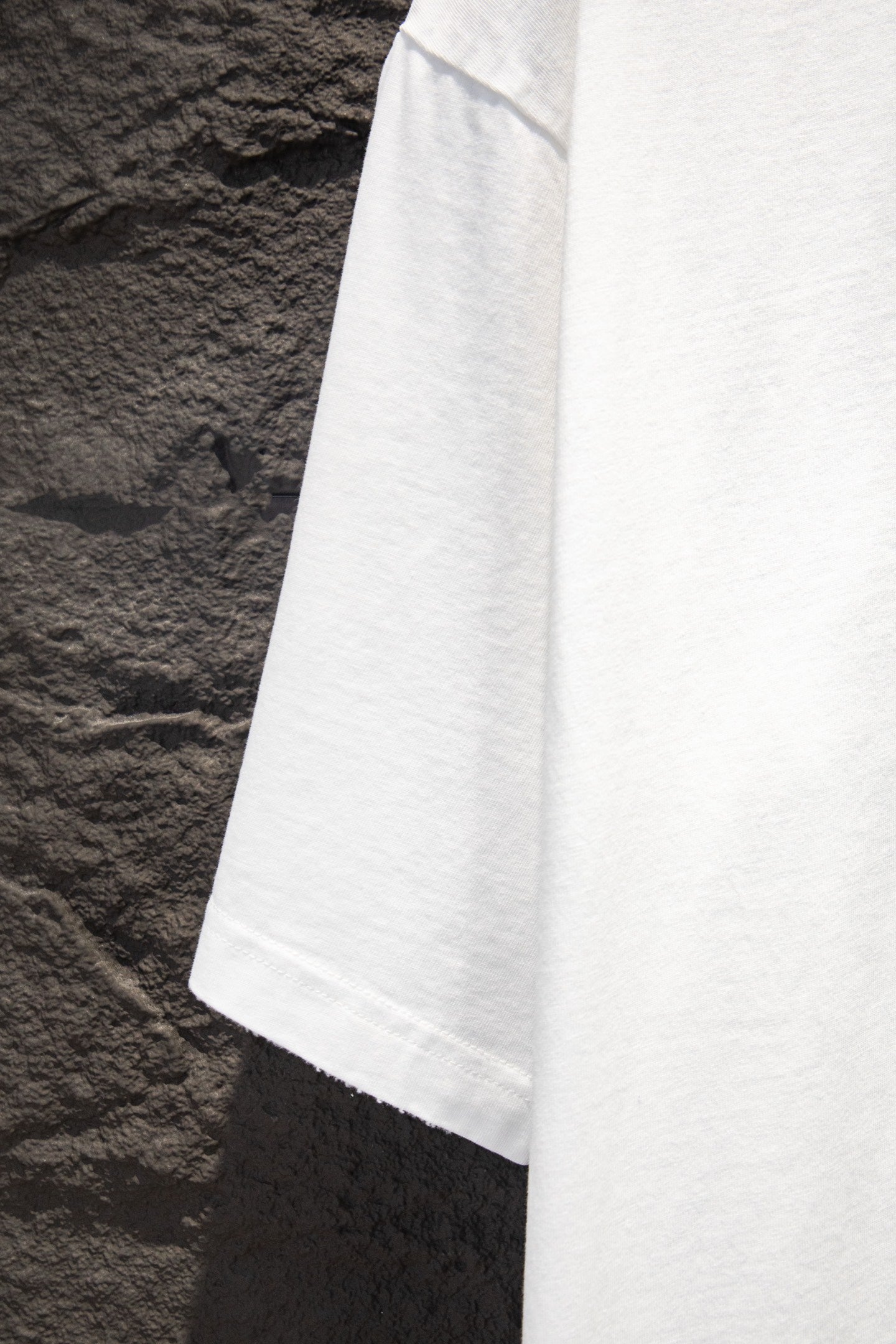 White short-sleeve T-shirt side view