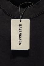 Balenciaga black T-shirt with Balenciaga branded hang tag at neckline