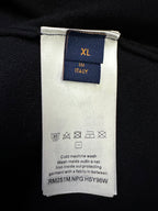 XL T-shirt care label with cold machine wash instructions, Italy