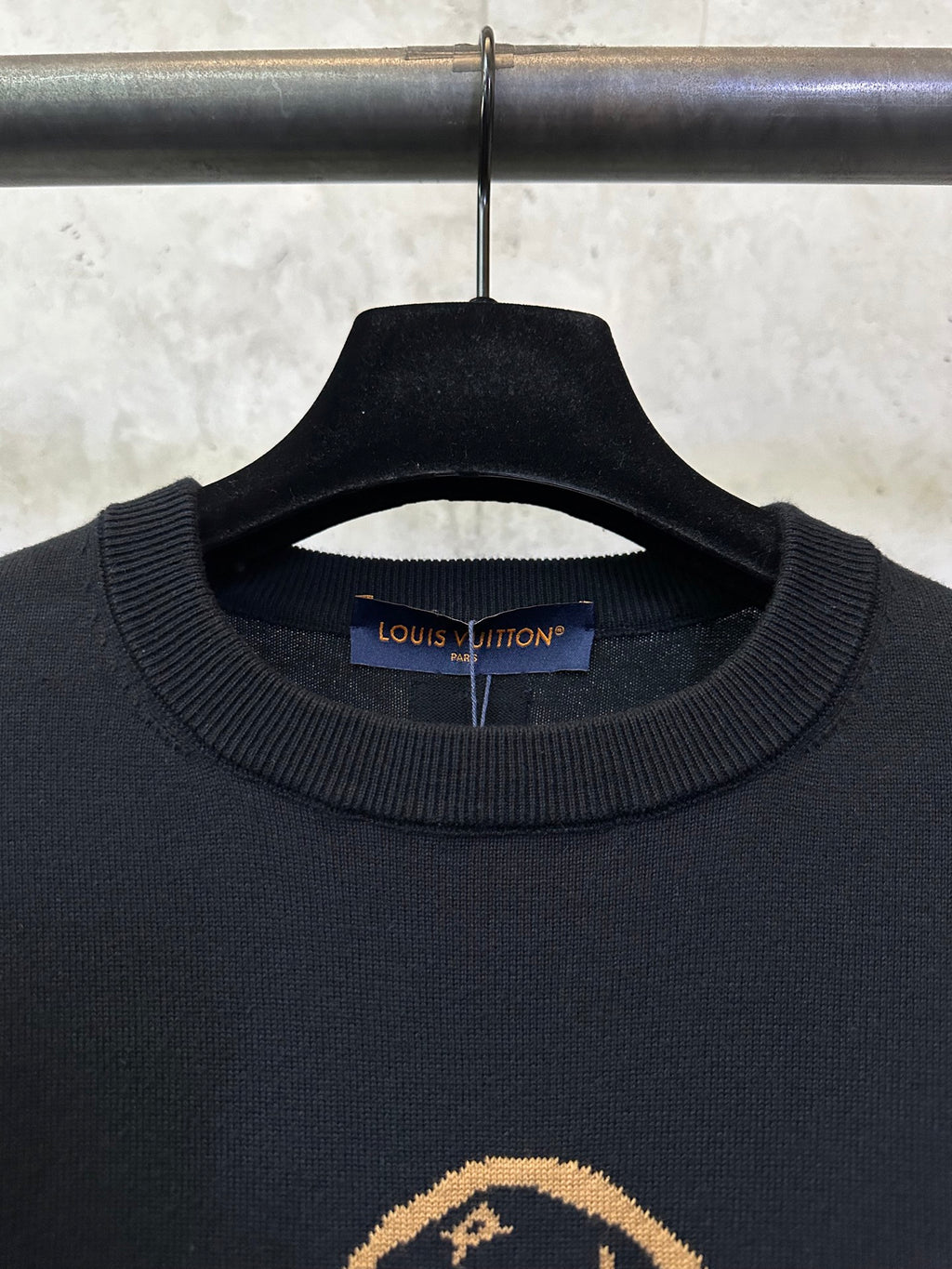 Black knit crewneck T-shirt with Louis Vuitton label and ribbed collar