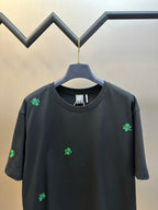 Dior dark short-sleeve T-shirt with scattered green clover embroidery, crew neck