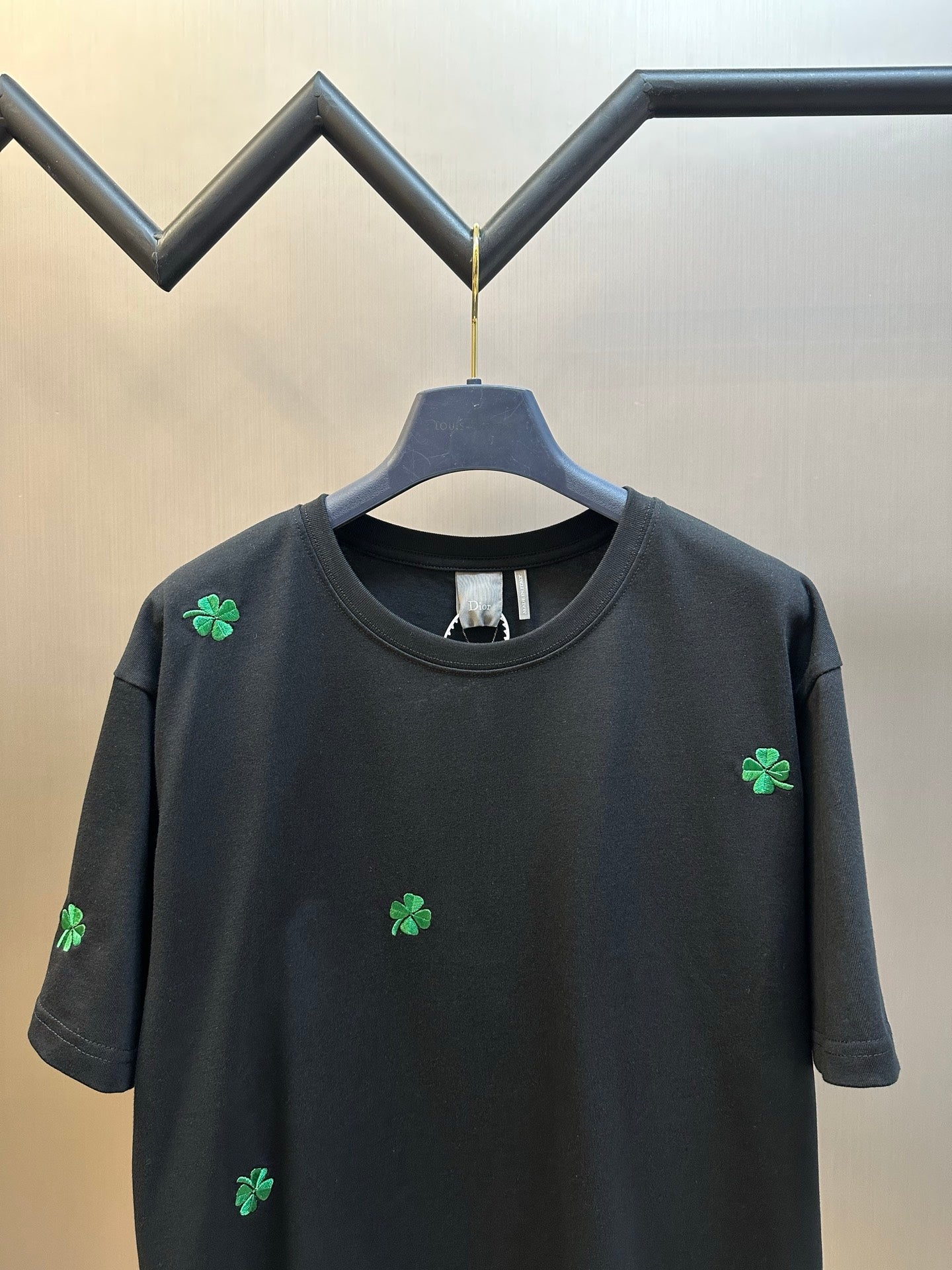 Dior dark short-sleeve T-shirt with scattered green clover embroidery, crew neck
