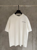 White short-sleeve T-shirt with small chest logo graphic