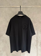 Black short-sleeve crewneck T-shirt with embroidered chest emblem on left side