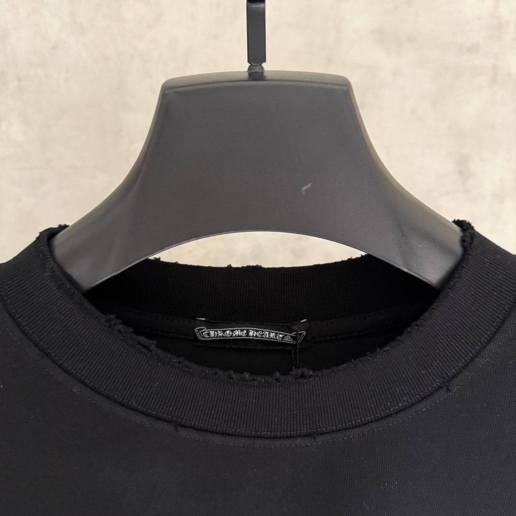 Black T-shirt neck label detail on inside collar