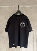 Black short-sleeve T-shirt with white circular front graphic emblem