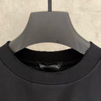Black short-sleeve T-shirt crew neck with interior label