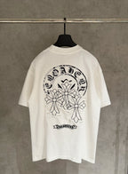 White crewneck T-shirt with large back graphic wreath and floral design