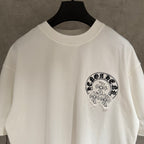 White crewneck T-shirt close-up of chest graphic print