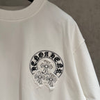 White T-shirt with embroidered chest logo graphic and crew neckline
