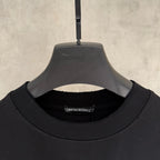 Black short-sleeve T-shirt with ribbed crew neck and inner neck label