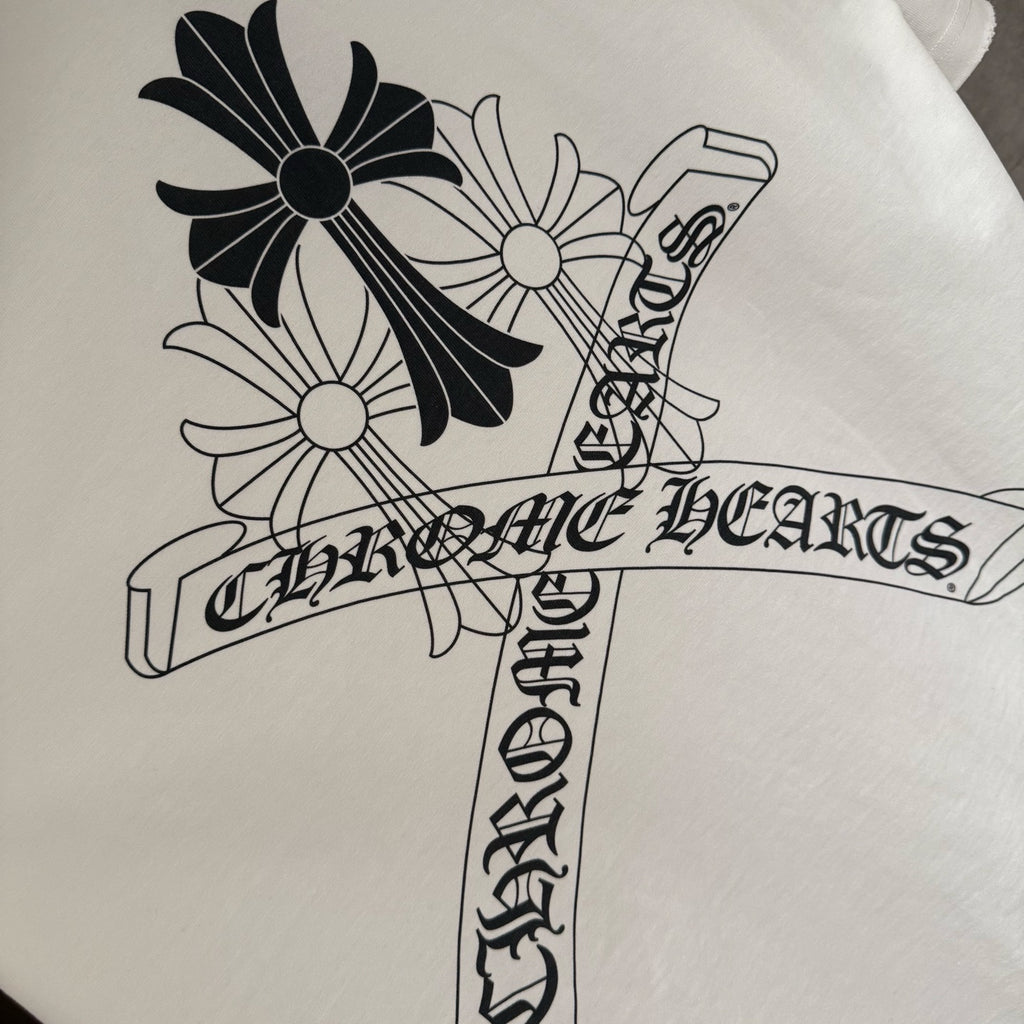 White T-shirt front graphic: black flower cross and ribbon text print