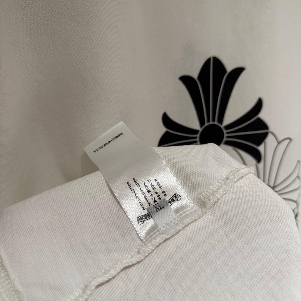 White T-shirt folded with inner care label tag attached