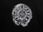 Circular chrome-style graphic print on black short-sleeve T-shirt