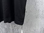 Black T-shirt side view with straight hem and short sleeve