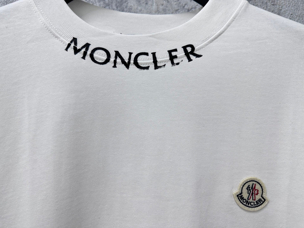 White Moncler T-shirt neckline with MONCLER text across collar