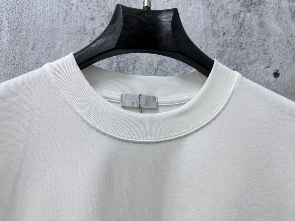 White crewneck T-shirt neckline and collar seam detail