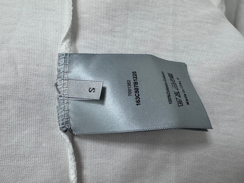 White T-shirt fabric label tag inside neck seam