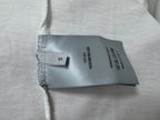 White T-shirt fabric label tag inside neck seam