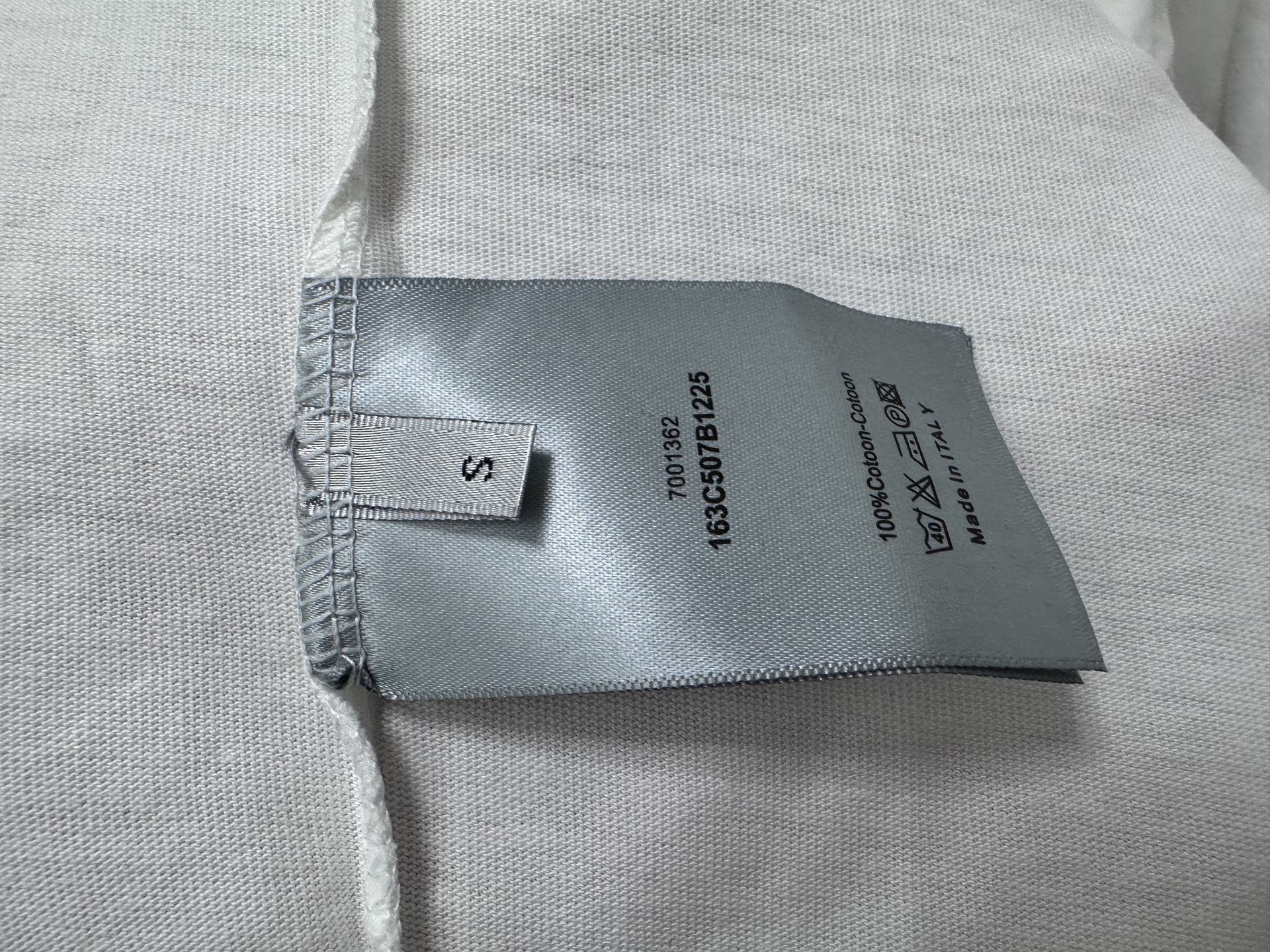 White T-shirt fabric label tag inside neck seam