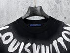Close-up short-sleeve black T-shirt neckline with white graffiti print