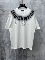 White T-shirt with black “Louisvuitton” graphic print and small charm icons
