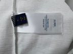 White T-shirt fabric tag and care label with printed product information