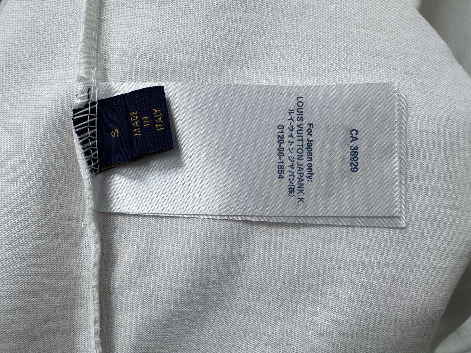 White T-shirt fabric tag and care label with printed product information