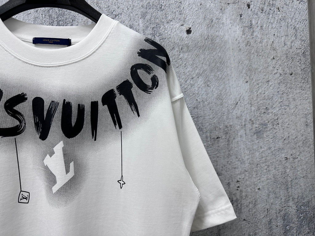 White T-shirt with close-up black “Louisvuitton” logo text and charm icons