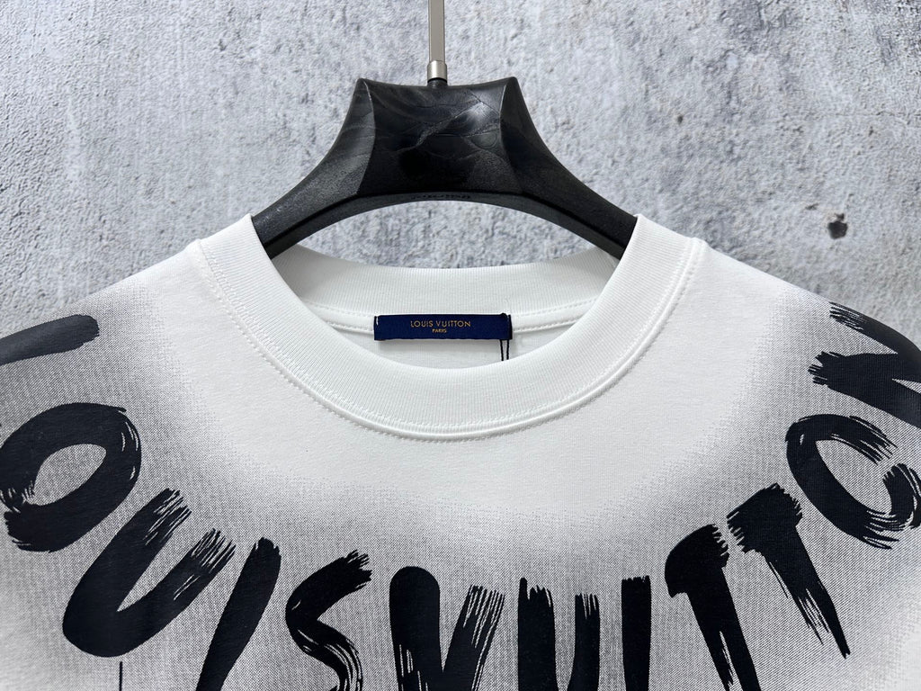White T-shirt neckline with black “Louisvuitton” graphic print across the chest