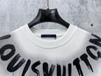 White T-shirt neckline with black “Louisvuitton” graphic print across the chest