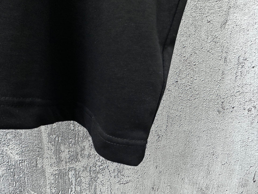 Balenciaga short-sleeve T-shirt, close-up of lower hem and sleeve cuff