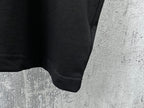 Balenciaga short-sleeve T-shirt, close-up of lower hem and sleeve cuff