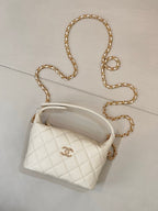 Chanel quilted mini bag, white, with gold chain strap and logo front