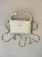 Chanel quilted mini bag, white, with gold chain strap and open top