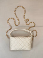 Chanel quilted mini bag, white, with gold chain strap and quilted front