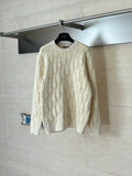 Cream knit sweater with long sleeves and allover Dior-style logo pattern