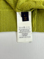 Lime green cardigan care label with size L and made in Italy