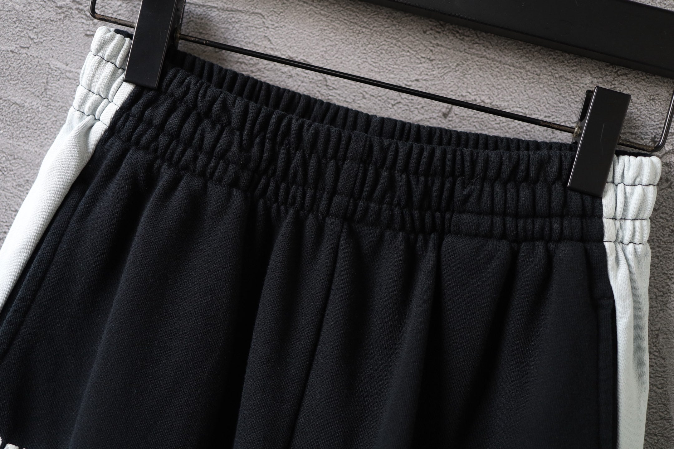 Black Balenciaga pants waistband with gathered elastic and drawstring loops