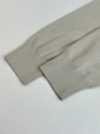 Light cream knit cardigan hem and ribbed cuff detail