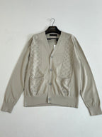 Light cream button-front knit cardigan with V-neck and textured panel detailing