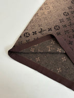 Louis Vuitton monogram shirt hem detail in dark brown