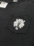 Dark long-sleeve T-shirt with large white graphic on chest pocket panel