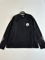 Dark long-sleeve T-shirt with front chest crest patch and embroidered sleeve details